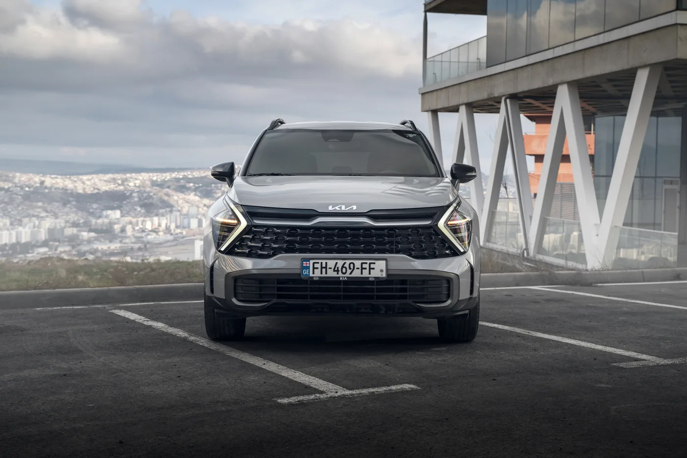 KIA SPORTAGE 2024 - side view
