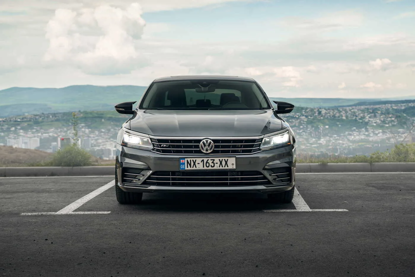 VW Passat R-Line 2018 - rear view - RentGeo Cars